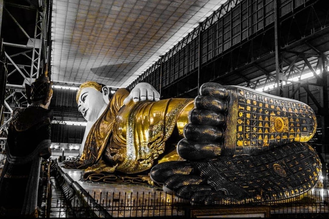 #sightsinyangon Did you know that the reclining budda in Chauk Htat Gyi Pagoda is one of the largest images in Myanmar? It's 72m long and housed in a large metal-roofed shed on Shwegonedine Street. The orignal Buddha  image was built in 1907 and rebuilt in 1957. 

📸 to khinmyatnthue 
.
.
.
#myanmarburma #myanmartrip #myanmar #myanmarphotos #travelasia #instamyanmar #shwedagon #sacredpagoda #agameoftones #chaukhtatgyipagoda #chaukhtetgyibuddha #burmese #lifewelltravelled #exploremore #pagoda #exploreasia #tlpicks #travellingthroughtheworld #beautifuldestinations #natgeotravel #artofvisuals