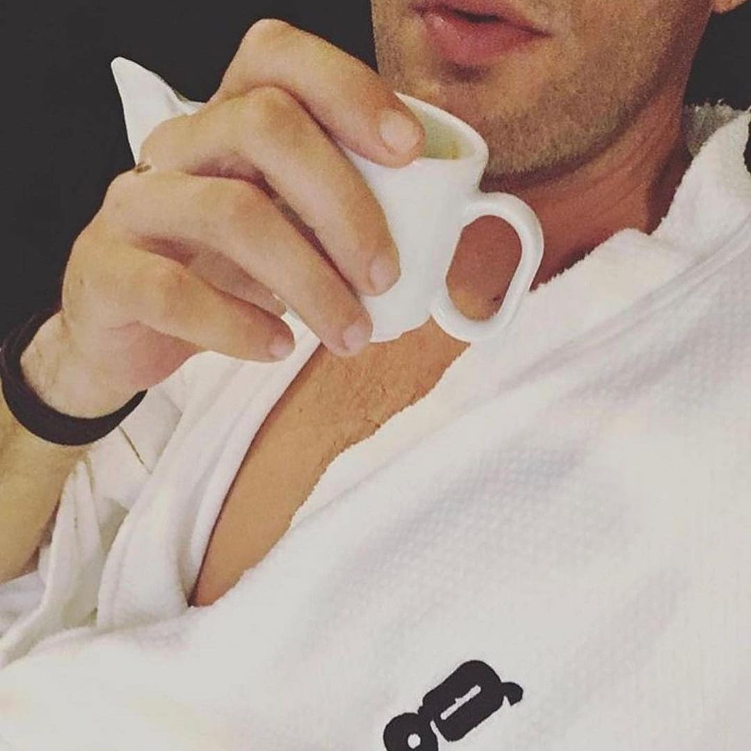 Hotel G guest in G robe with coffee